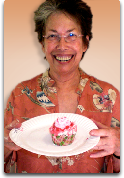 Dr. Lee Lipp with a cupcake.